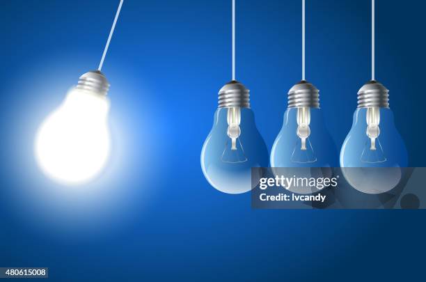 bulb newton cradle - newtons cradle stock illustrations