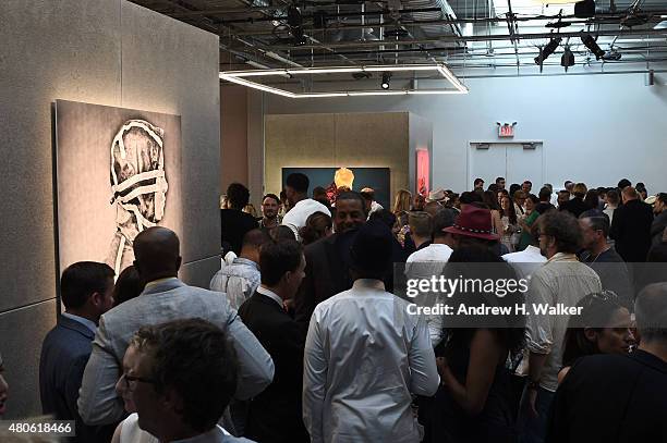 Guests attend the opening event for New York Fashion Week: Men's S/S 2016 at Amazon Imaging Studio on July 13, 2015 in Brooklyn, New York.