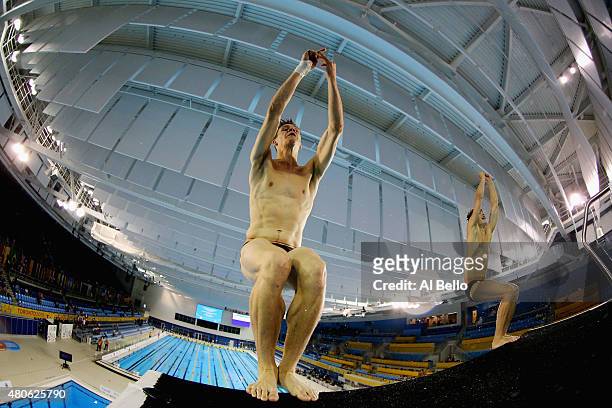 Phillippe Gagne and Vincent Riendeau of Canada dive during training before the Men's Synchronised 10m Platform Final at the Pan Am Games on July 13,...