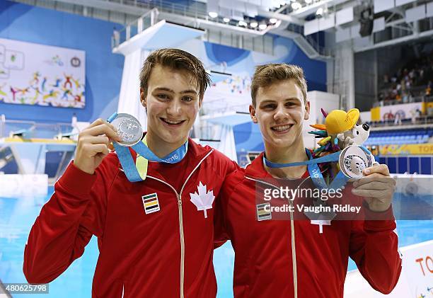 Philippe Gagne and Vincent Riendeau of Canada win Silver in the Men's 10m Synchro Final during the Toronto 2015 Pan Am Games at the CIBC Aquatic...