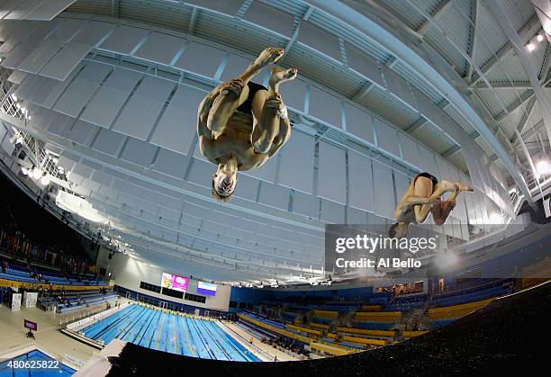 Zachary Gagne and Ryan Hawkins of the USA dive during training before the Men's Synchronised 10m Platform Final at the Pan Am Games on July 13, 2015...