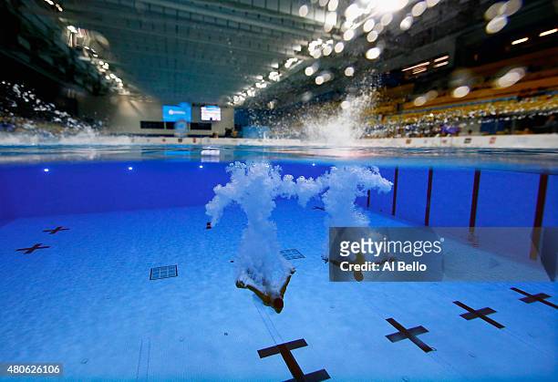 Jeinkler Aguirre and Jose Antonio Guerra of Cuba dive during the Men's Synchronised 10m Platform Final at the Pan Am Games on July 13, 2015 in...