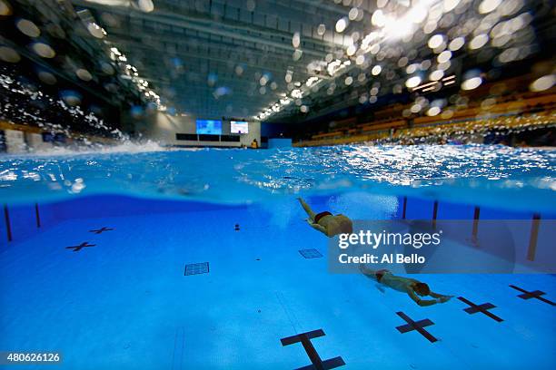 Zachary Cooper and Ryan Hawkins of the USA dive during the Men's Synchronised 10m Platform Final at the Pan Am Games on July 13, 2015 in Toronto,...