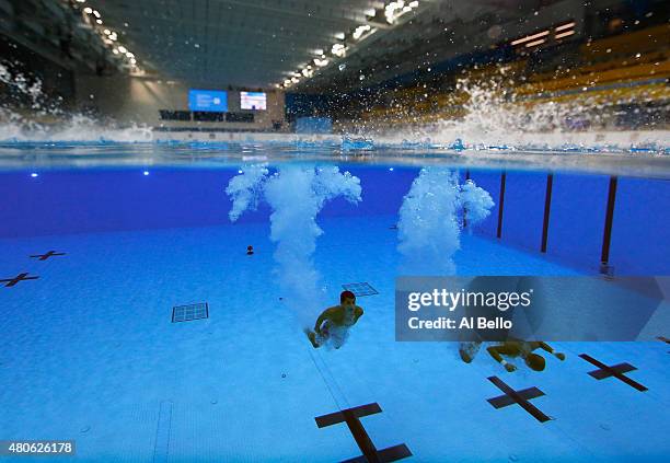 Victor Ortega and Guillermo Rios of Columbia dive during the Men's Synchronised 10m Platform Final at the Pan Am Games on July 13, 2015 in Toronto,...