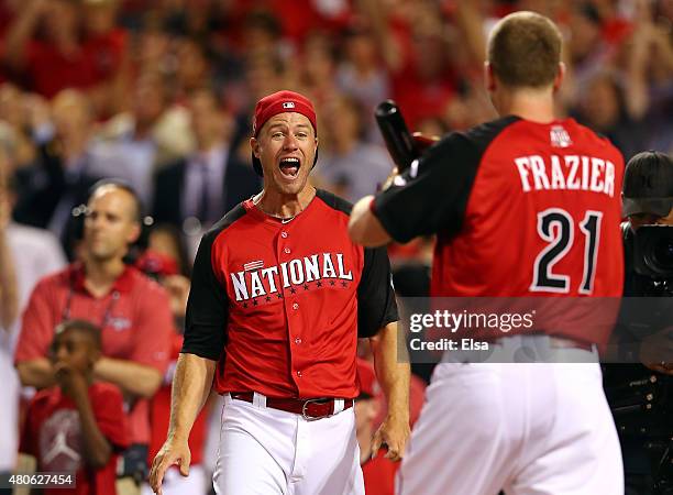 National League All-Star Todd Frazier of the Cincinnati Reds celebrates with his brother Charlie after winning the Gillette Home Run Derby presented...