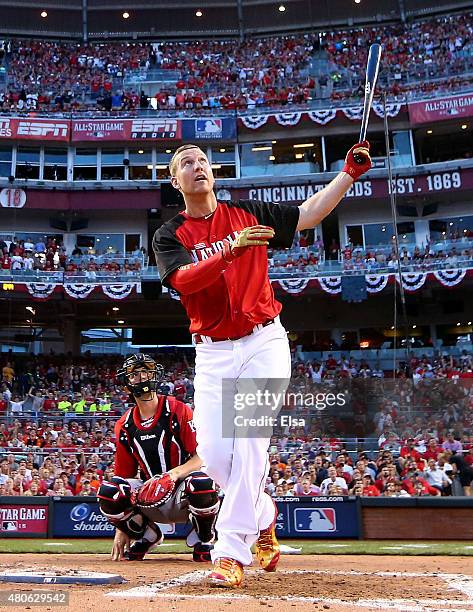 National League All-Star Todd Frazier of the Cincinnati Reds looks on after batting during the Gillette Home Run Derby presented by Head & Shoulders...