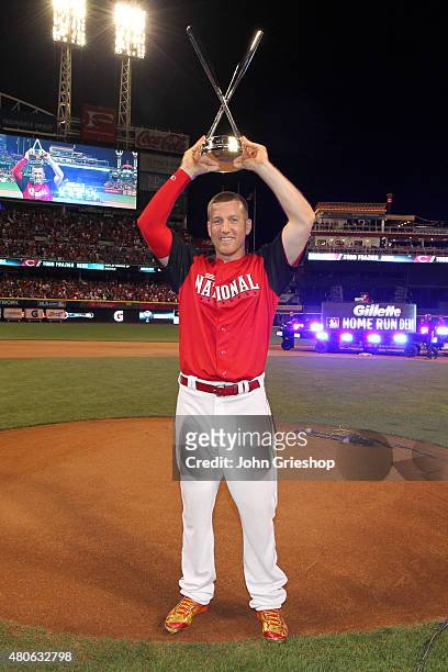 National League All-Star Todd Frazier of the Cincinnati Reds holds up the Home Run Derby trophy after winning the Gillette Home Run Derby presented...