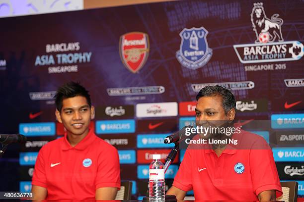 Sundramoorthy manager of Singapore Select XI speaks as Izwan Mahbud looks on during the Barclays Asia Trophy Press Conference at Grand Hyatt Hotel on...