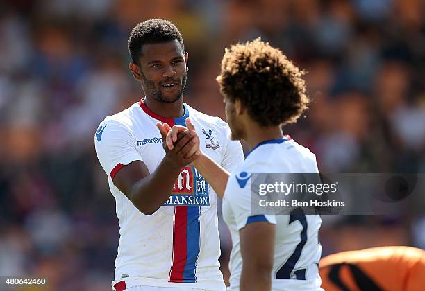 Reise Allassani of Crystal Palace celebraftes with team mate Fraizer Campbell after scoring during a Pre Season Friendly between Barnet and Crystal...