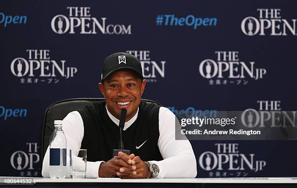 Tiger Woods of the United States smiles during a press conference ahead of the 144th Open Championship at The Old Course on July 14, 2015 in St...