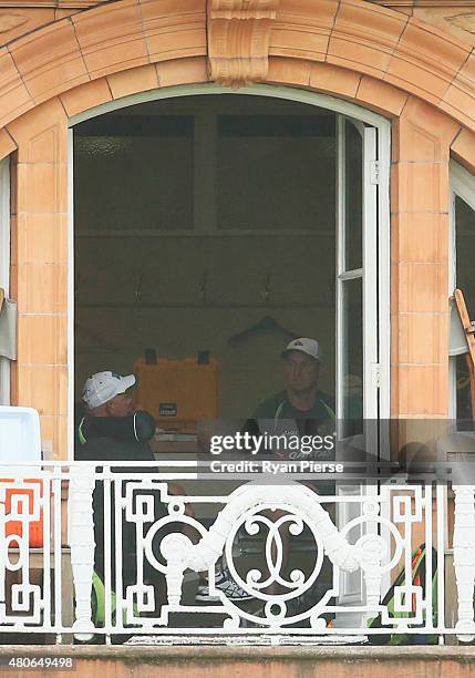 Brad Haddin of Australia speaks with Australian coach Darren Lehmann during a nets session ahead of the 2nd Investec Ashes Test match between England...