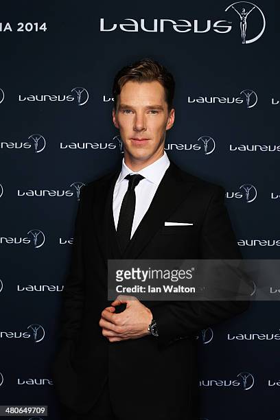 Actor Benedict Cumberbatch poses with the Laureus trophy during the 2014 Laureus World Sports Awards at the Istana Budaya Theatre on March 26, 2014...