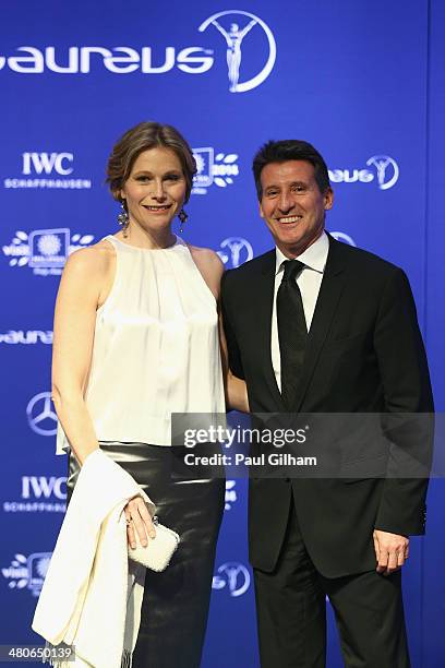 Laureus Academy member Lord Sebastian Coe and guest attend the 2014 Laureus World Sports Awards at the Istana Budaya Theatre on March 26, 2014 in...