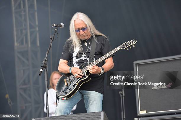 Guitarist Mick Box of English rock group Uriah Heep performing live on the Zippo Encore Stage at Download Festival on June 14, 2013.