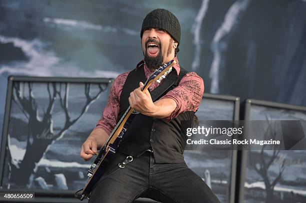 Guitarist Rob Caggiano of Danish hard rock group Volbeat performing live on the Zippo Encore Stage at Download Festival on June 14, 2013.