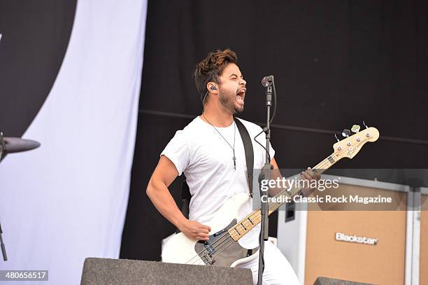 Bassist Simon Mitchell of English melodic hardcore group Young Guns performing live on the Main Stage at Download Festival on June 15, 2013.