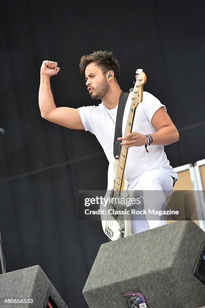 Bassist Simon Mitchell of English melodic hardcore group Young Guns performing live on the Main Stage at Download Festival on June 15, 2013.