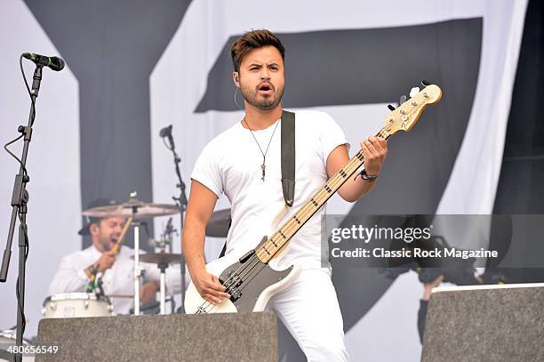 Bassist Simon Mitchell of English melodic hardcore group Young Guns performing live on the Main Stage at Download Festival on June 15, 2013.