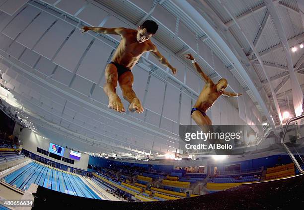 Victor Ortega and Guillermo Rios of Columbia dive during training before the Men's Synchronised 10m Platform Final at the Pan Am Games on July 13,...