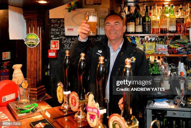 Muli time Tour De France winner Bernard Hinault samples a beer in the Robin Hood Inn at Cragg Vale, Englands longest continuous uphill climb and part...