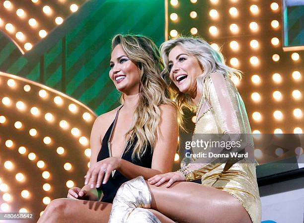 Chrissy Teigen and Julianne Hough appear during the Lip Sync Battle Live at Central Park SummerStage on July 13, 2015 in New York City.