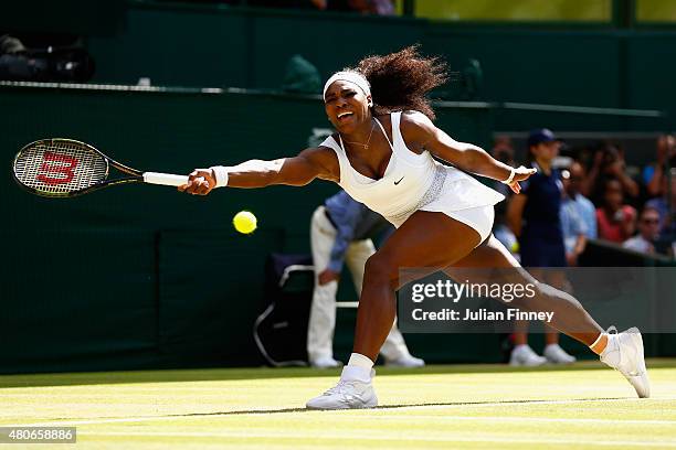 Serena Williams of United States stretches for a forehand in the Final of the Ladies Singles against Garbine Muguruza of Spain during the day twelve...