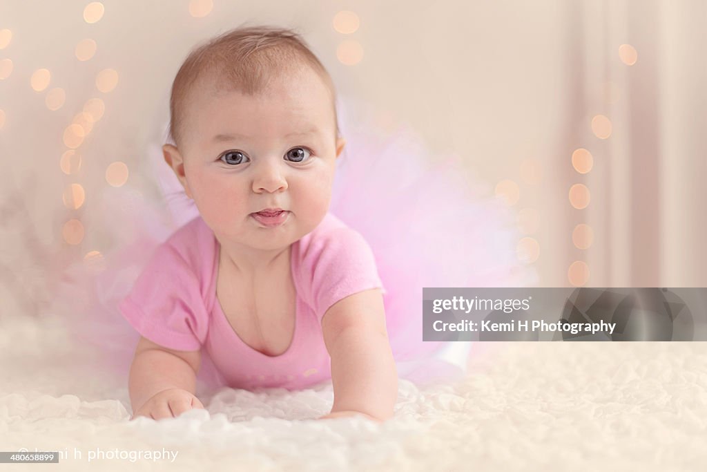 Cute baby girl with pink tutu