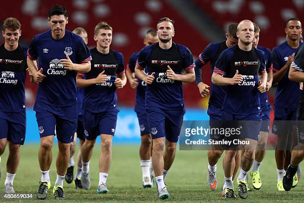 Everton players warm up during a open training session ahead of the match between Everton and Stoke City during the 2015 Barclays Asia Trophy...