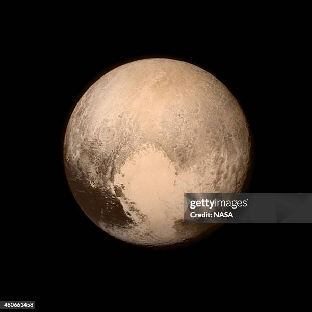 In this handout provided by the National Aeronautics and Space Administration , Pluto nearly fills the frame in this image from the Long Range...