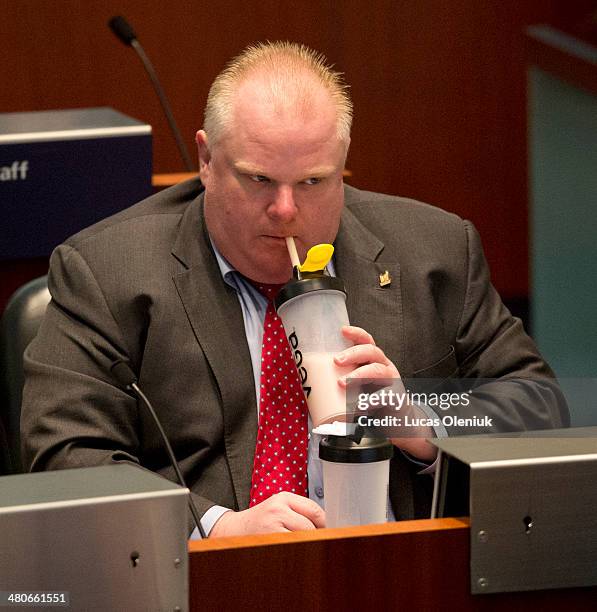 Toronto Mayor Rob Ford drank a couple shakes during the debate over the Island Airport expansion Tuesday afternoon at city hall. Mar 25, 2014