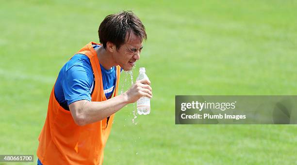 Shinji Okazaki feels the heat during the Leicester City training session at their pre-season training camp on July 14, 2015 in Spielfeld, Austria.