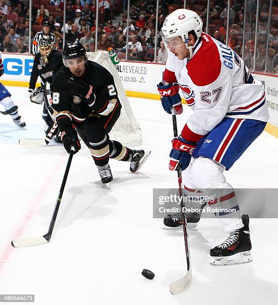 Alex Galchenyuk of the Montreal Canadiens handles the puck against Mark Fistric the Anaheim Ducks on March 5, 2014 at Honda Center in Anaheim,...