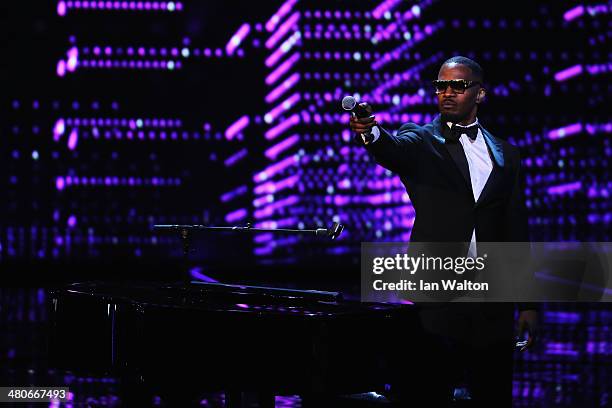 Jamie Foxx performs on stage during the 2014 Laureus World Sports Award show at the Istana Budaya Theatre on March 26, 2014 in Kuala Lumpur, Malaysia.