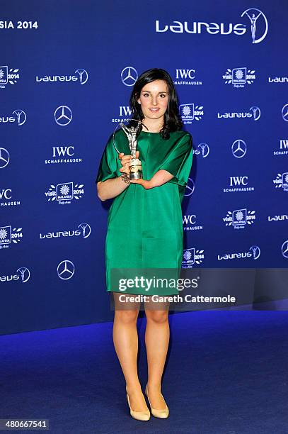 Skier Marie Bochet winner of the Laureus World Sportsperson of the Year with a Disability award poses with their trophy at the winners photocall...