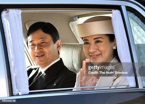 Crown Prince Naruhito and Crown Princess Masako are seen on arrival at the Imperial Palace to make an year-end greeting to Emperor and Empress at the...