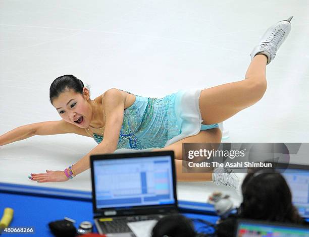 Kanako Murakami falls while competing in the Ladies' Singles Free Program during day three of the All Japan Figure Skating Championships at Namihaya...