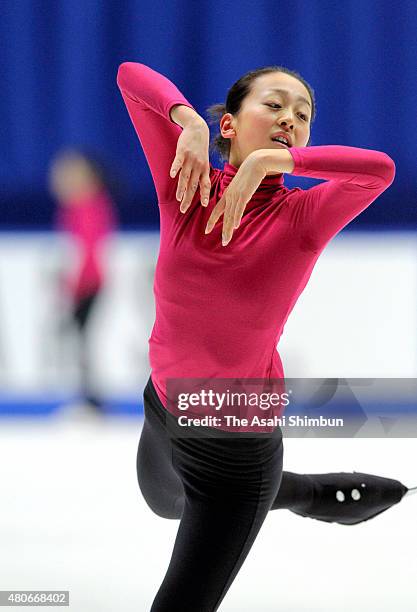 Mao Asada in action during a training session of the All Japan Figure Skating Championships at Namihaya Dome on December 22, 2011 in Kadoma, Osaka,...