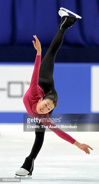 Mao Asada in action during a training session of the All Japan Figure Skating Championships at Namihaya Dome on December 22, 2011 in Kadoma, Osaka,...