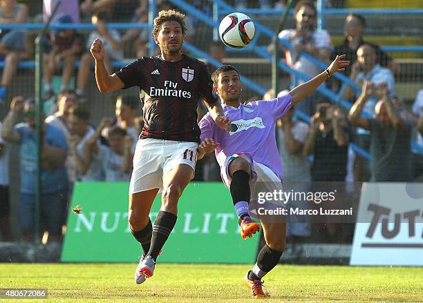 Alessio Cerci of AC Milan competes for the ball during the preseason friendly match between AC Milan and Legnano on July 14, 2015 in Solbiate Arno,...