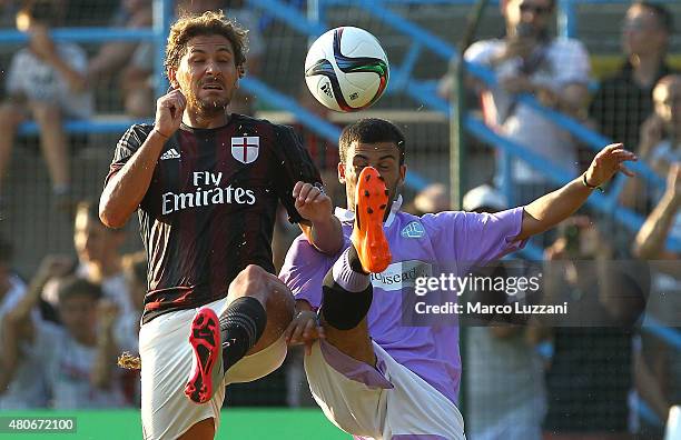 Alessio Cerci of AC Milan competes for the ball during the preseason friendly match between AC Milan and Legnano on July 14, 2015 in Solbiate Arno,...