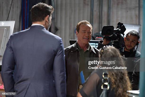 Arnold Schwarzenegger and Joe Manganiello on the set of Despierta America at Univision Headquarters on March 26, 2014 in Miami, Florida.