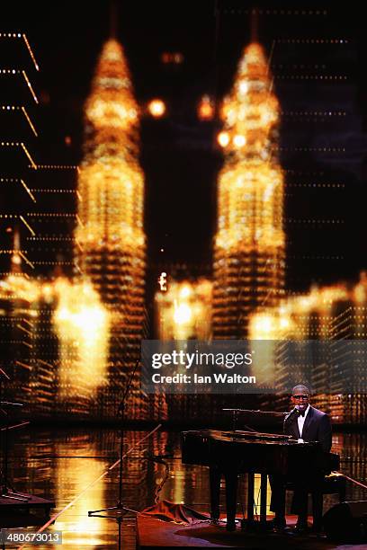 Jamie Foxx performs on stage during the 2014 Laureus World Sports Award show at the Istana Budaya Theatre on March 26, 2014 in Kuala Lumpur, Malaysia.