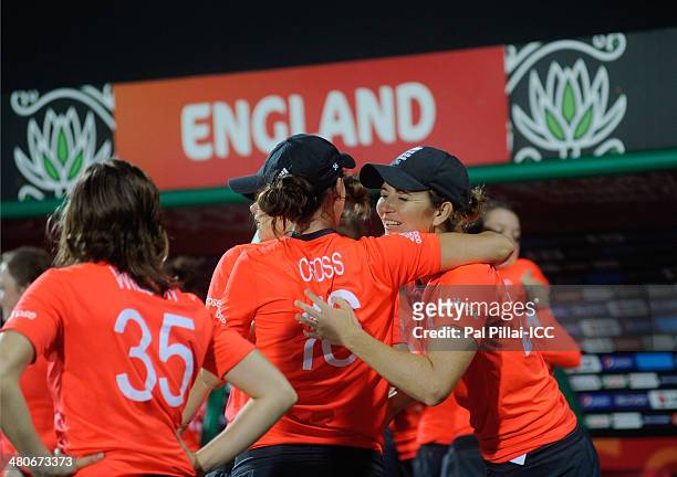 Charlotte Edwards captain of England celebrates with teammates after winning the ICC Womens World Twenty20 match between England and India played at...