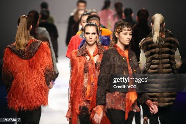 Model showcases designs on the runway during the Fur Fashion Collection show on day two of the Mercedes-Benz China Fashion Week Autumn/Winter...