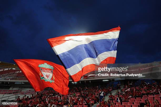 Liverpool FC fans rise the Liverpool FC and Thailand flag during the international friendly match between Thai Premier League All Stars and Liverpool...