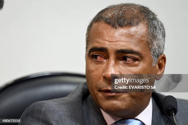 Former Brazilian football star and current senator Romario attends the opening session of the parliamentary committee of inquiry into corruption in...