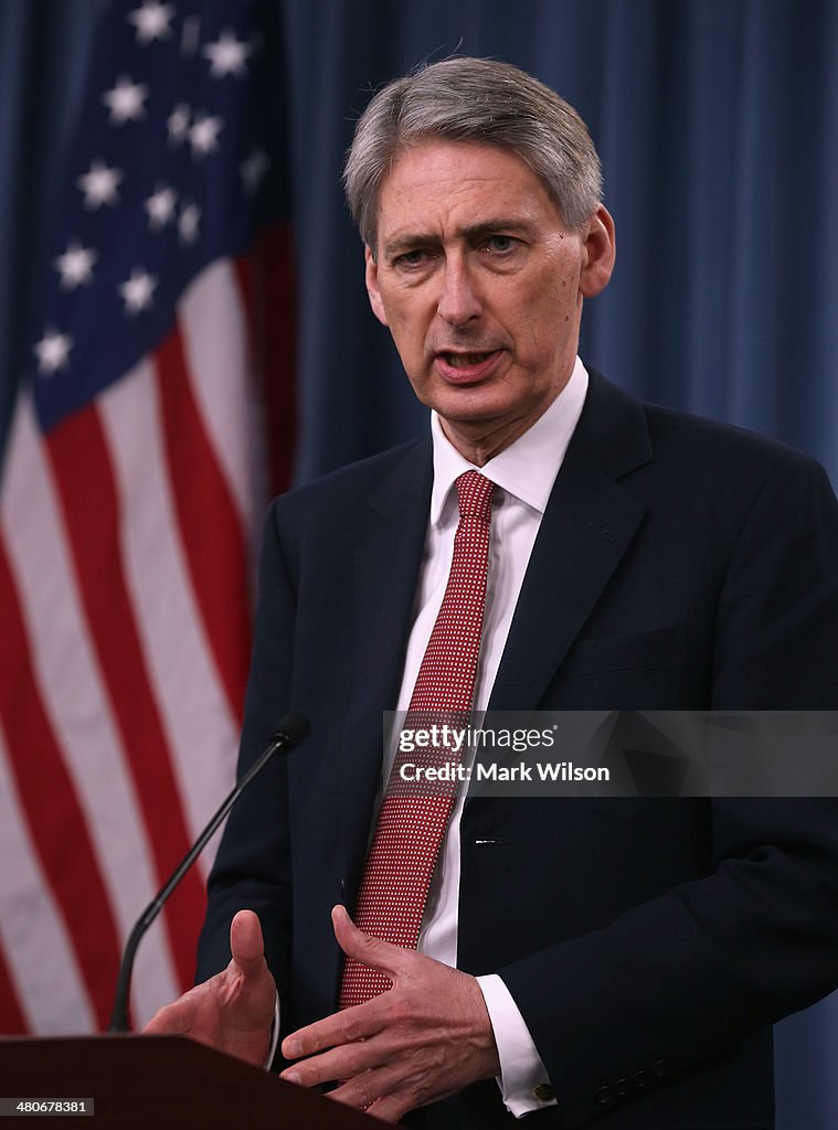 Chuck Hagel Hosts UK Secretary Of Defence Phillip Hammond At The Pentagon