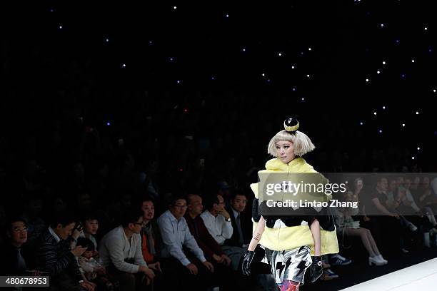 Model showcases designs on the catwalk during the CRZ Collection show of Mercedes-Benz China Fashion Week Autumn/Winter 2014/2015 at the 751D-PARK...