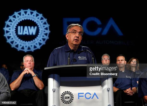Sergio Marchionne, chief executive officer of Fiat Chrysler Automobiles NV , left, speaks during the start of labor negotiations with the United Auto...