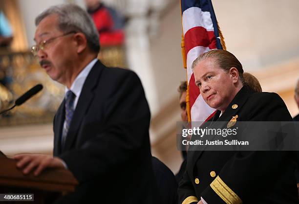 San Francisco fire department chief Joanne Hayes-white looks on as San Francisco mayor Ed Lee speaks during a remembrance ceremony held for San...